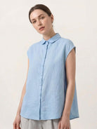 100% linen two-way button blouse with A-line silhouette, cap sleeves, and Peter Pan collar