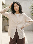 100% linen pinstripe shirt with loose fit and drop shoulders