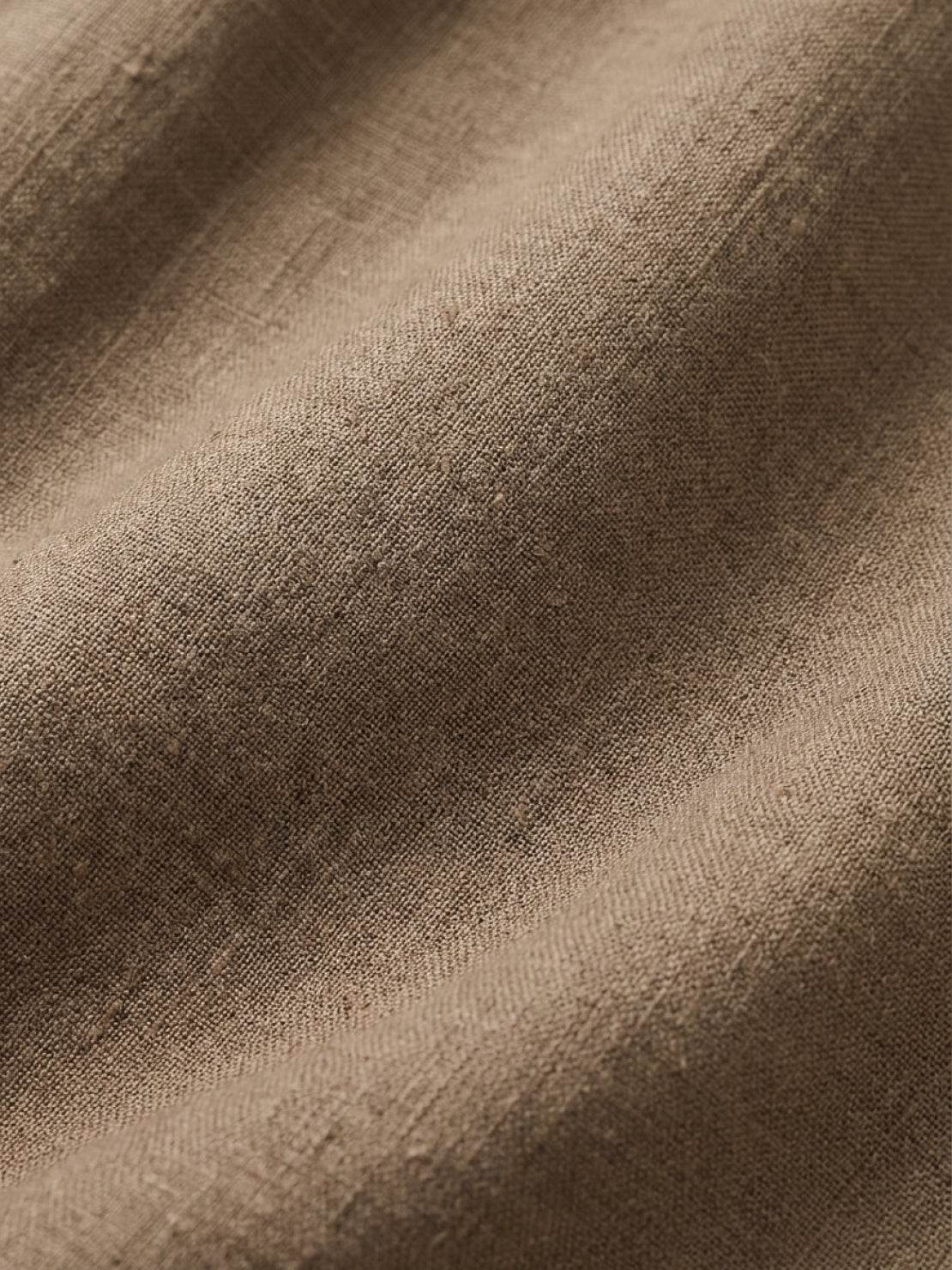 100% linen wide-leg pants with high-rise elastic waistband and side pockets