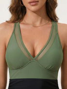 Tummy Control Mesh Swim Dress with deep V-neck mesh panel, ruching waist, adjustable racerback straps, and side drawstring hem.