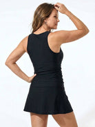 High-neck ruched tankini set with gathered side seams and built-in brief for swim skirt or shorts.