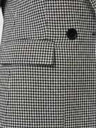 Black and white classic houndstooth commuter blazer with structured shoulders and relaxed fit