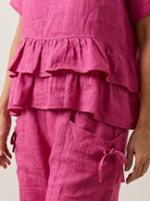 Cotton relaxed shorts and matching short sleeve top two-piece co-ord set with ruffle hem and side pockets in multiple colors