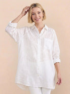 Relaxed oversized linen shirt with dropped shoulders and back-pleat button detail in cotton fabric