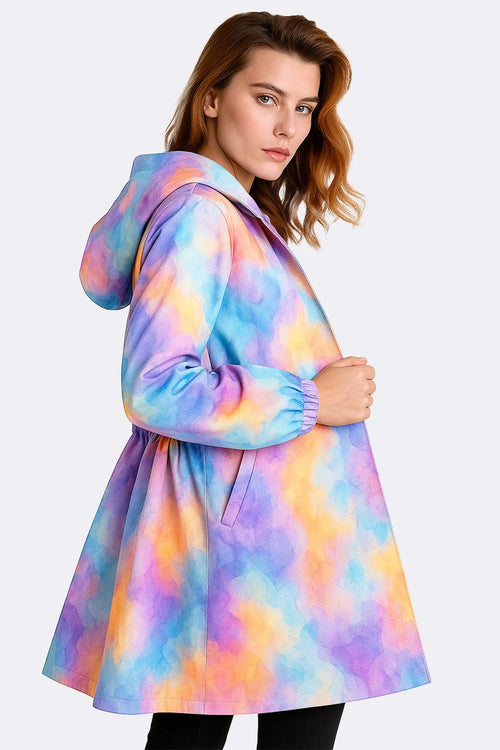 Water-resistant oversized hooded windbreaker rain jacket in colorful pastel tie-dye pattern