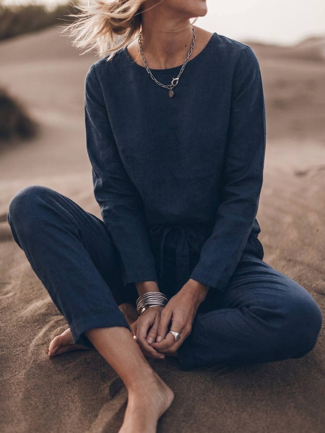 woman wearing cotton-linen monochrome relaxed longline top and wide-leg pants set