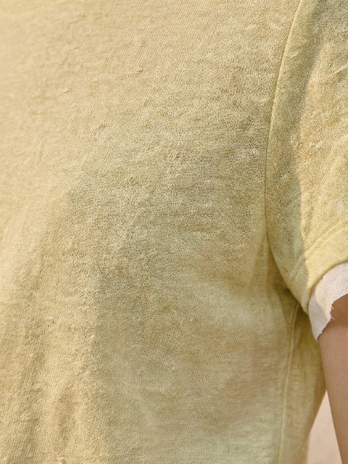 100% linen tee with rolled cuff sleeves and relaxed scoop neckline