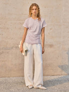 100% linen rolled cuff tee with relaxed scoop neckline and contrast inner lining