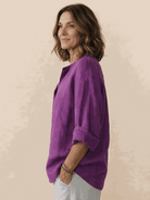 white pure linen age-defying shirt with button detail on a mannequin