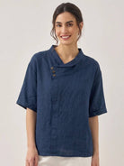 100% linen relaxed V-neck top with asymmetric button detail in cream color
