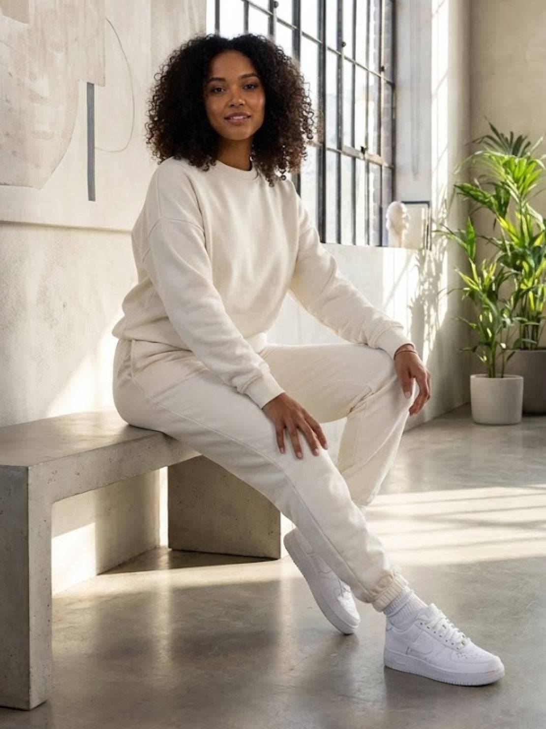Woman wearing Classic Comfort Athleisure Set in neutral tones, showcasing stretchy, flattering activewear ideal for all-day comfort and versatile style
