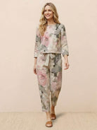 Woman wearing cotton-linen monochrome longline top and wide-leg pants set