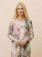 Woman wearing a relaxed cotton-linen monochrome longline top and wide-leg pants set