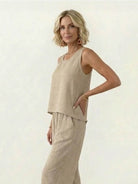 Dreamcatcher Crochet-Back two-piece set with asymmetric top and wide-leg palazzo pants