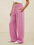 Women's high-waist pink cotton linen palazzo pants with wide legs and pockets