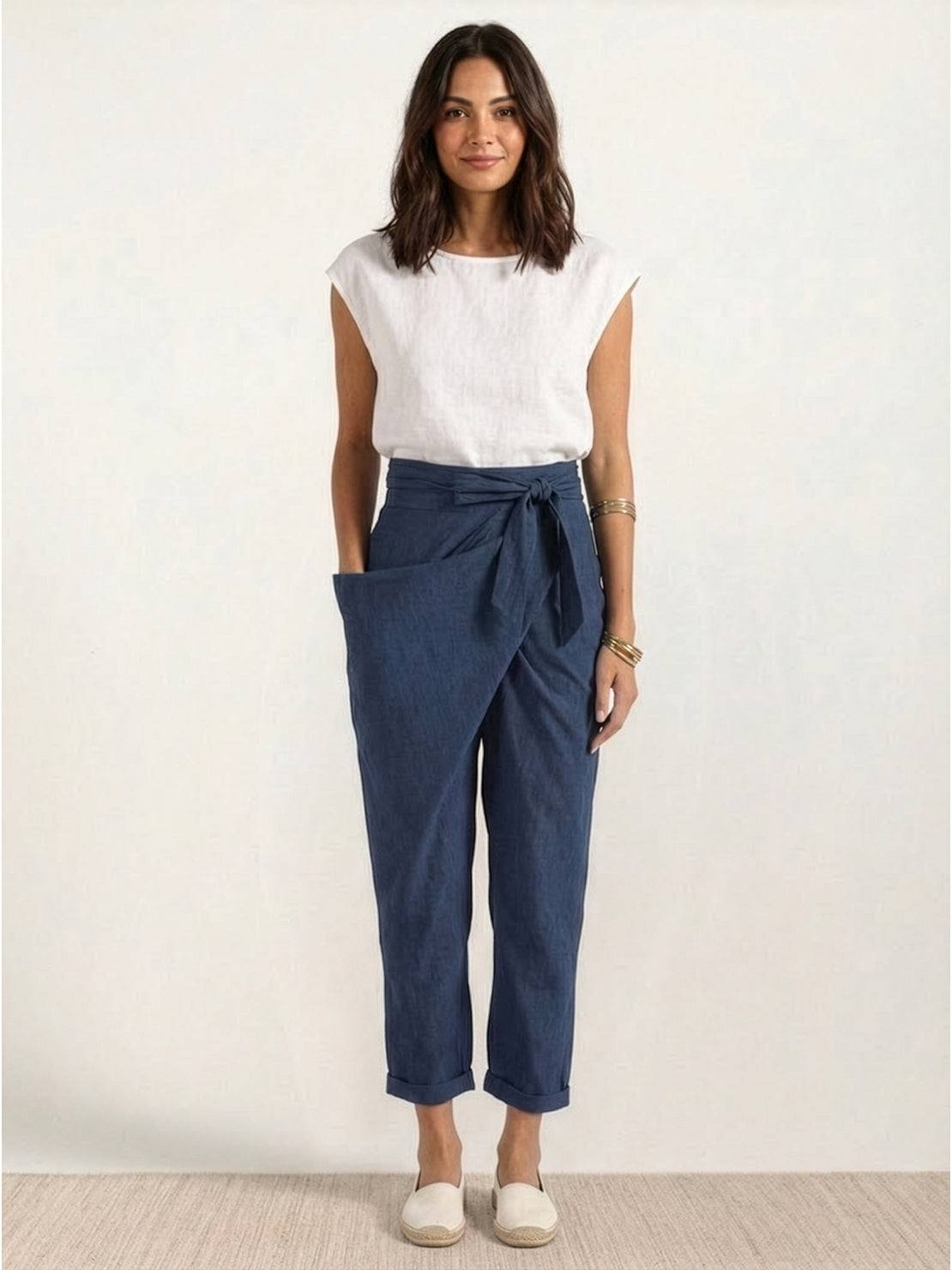 Woman wearing high-waist wrapped comfy pants with breathable, lightweight fabric and loose fit