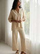 Woman wearing a multi-weather comfort oversized two-piece set with cropped wide pants and long sleeves in a casual relaxed fit