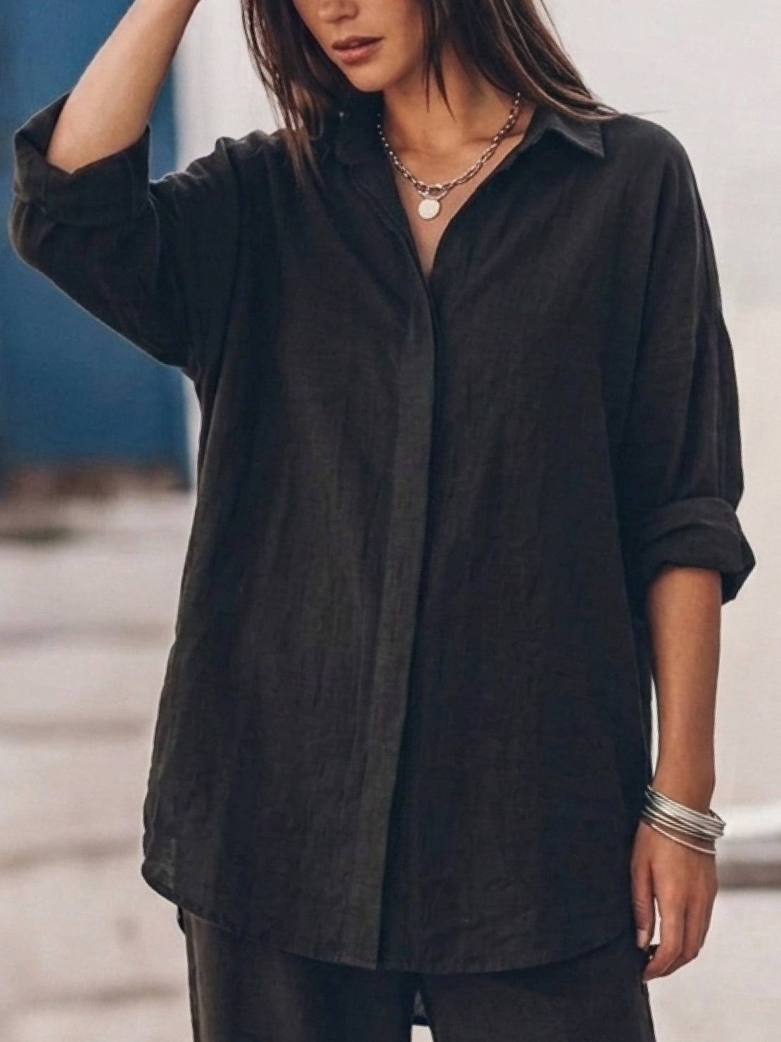 Model wearing oversized 100% cotton shirt and wide-leg pants co-ord set in relaxed fit.