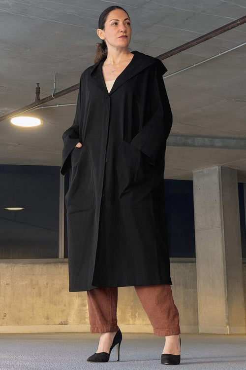 One size waterproof oversized windbreaker jacket with attached hood and large front pockets