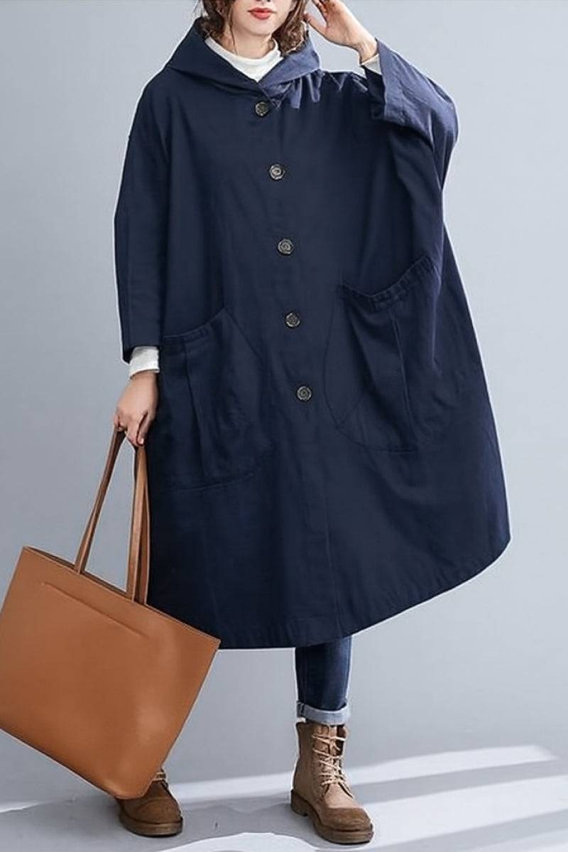Oversized navy blue water resistant windbreaker jacket with hood and large front pockets for women