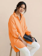 Breathable oversized linen shirt with relaxed fit and button-back detail in soft cotton-linen blend