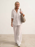 Model wearing oversized 100% cotton shirt with wide-leg pants co-ord set