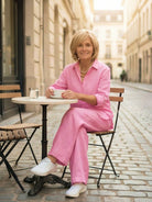 Model wearing oversized 100% cotton shirt and wide-leg pants co-ord set in relaxed fit