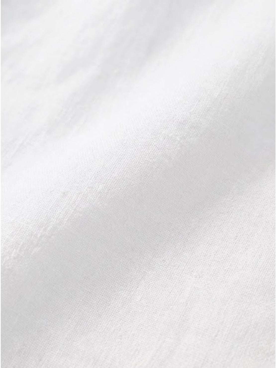 Close-up of soft white pure linen fabric for Pure Linen Age-Defying Shirt