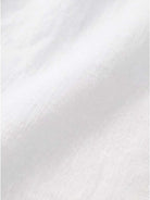 Close-up of soft white pure linen fabric for Pure Linen Age-Defying Shirt