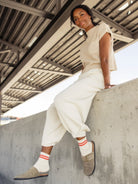 Woman wearing comfy couture knit sweater two-piece set with relaxed fit in neutral tones