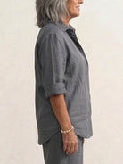 Woman wearing an oversized 100% cotton shirt with wide-leg pants co-ord set in a relaxed silhouette