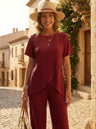 Textured Elegance two-piece women's outfit with asymmetrical top and wide-leg pants in soft stretch fabric