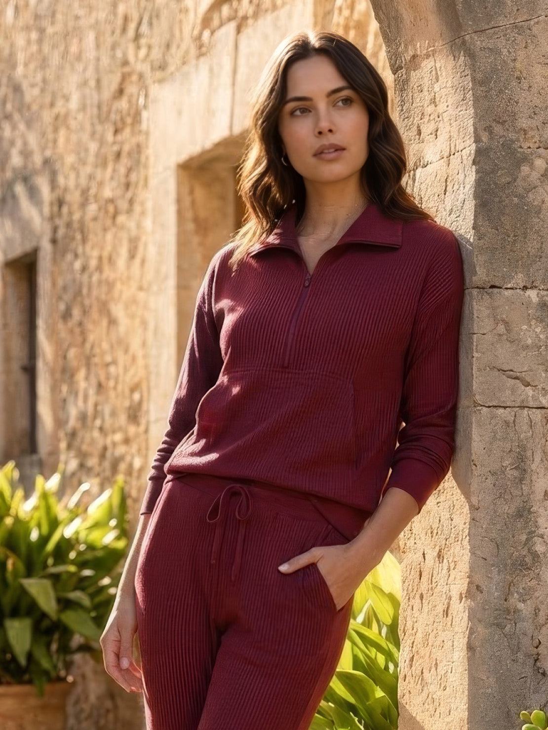 Unisex half-zip pullover and sweatpants set in relaxed fit with soft fabric for everyday comfort
