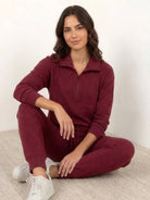Unisex half-zip pullover and sweatpants set in soft fabric for casual comfort and travel