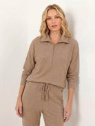 Unisex half-zip pullover and matching sweatpants set for comfortable casual wear