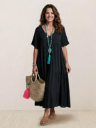 V-neck two-tiered maxi swing dress in flowy cotton fabric with irregular hemline and draped sleeves