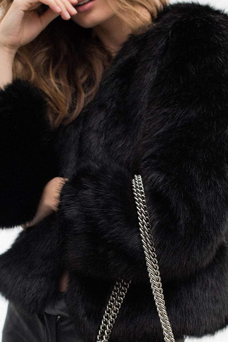 Black bold faux fur luxe jacket with V neckline and button front closure, long sleeves, and soft lightweight faux mink fur blend.